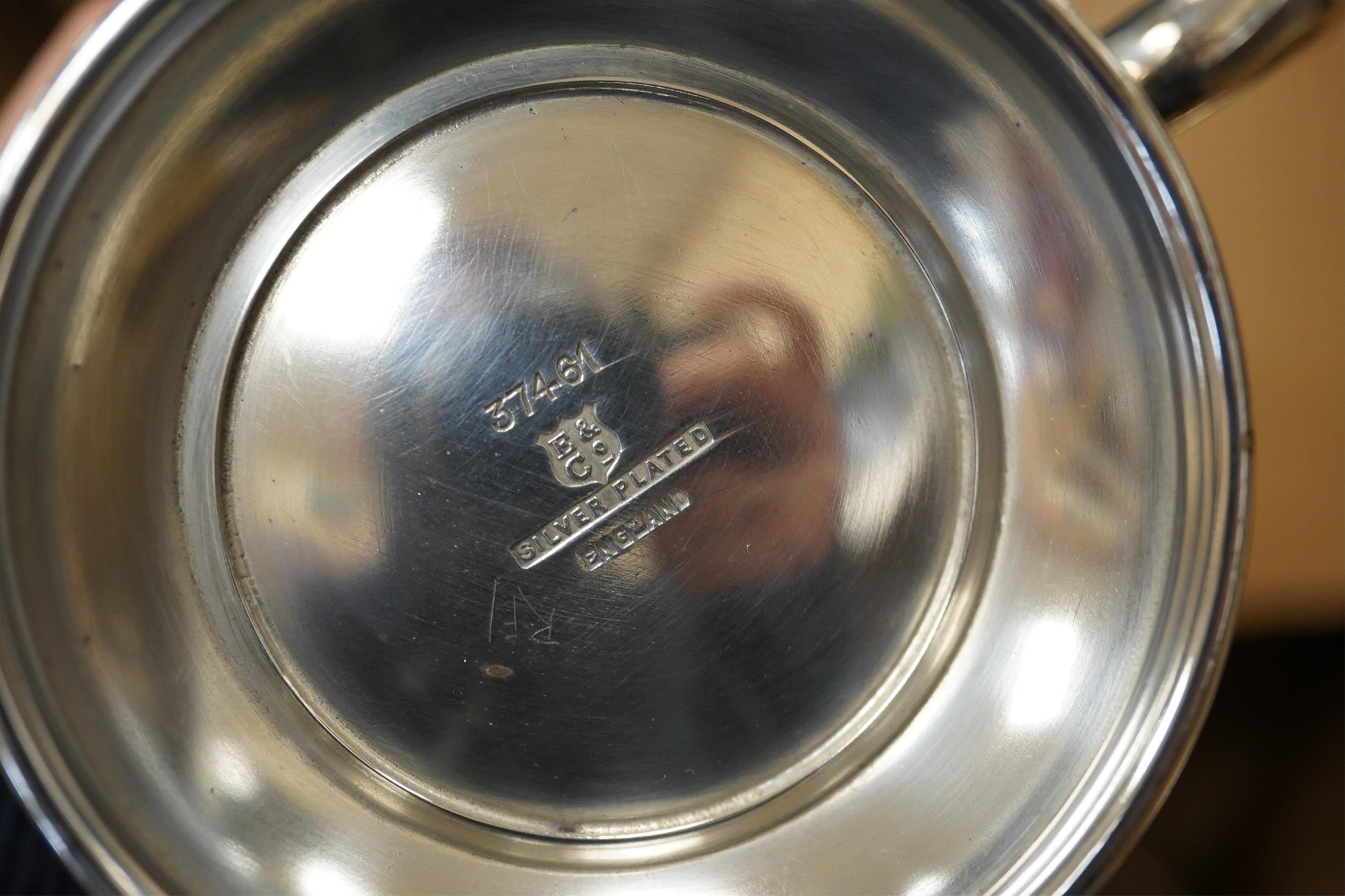 A quantity of assorted plated ware including entrée dishes, toast racks, salvers, pair of coasters and a coromandel wood tantalus (no key) etc.